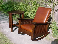 Early Gustav Stickley design reproduction lamp table shown with Slant-arm spindle Morris/Rocker.